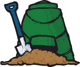 Shovel in a pile of compost