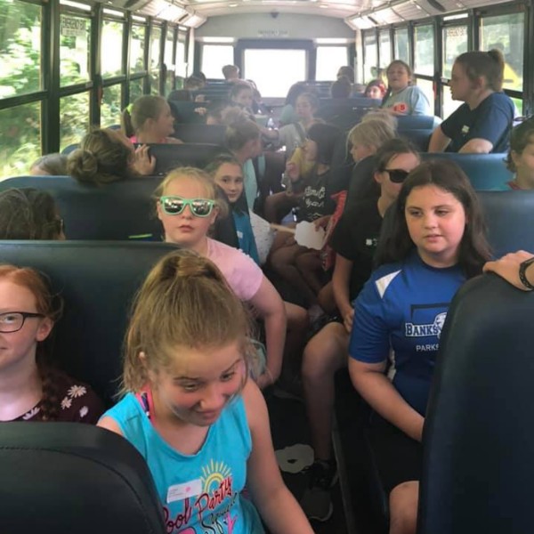 Kids Riding Bus to Camp