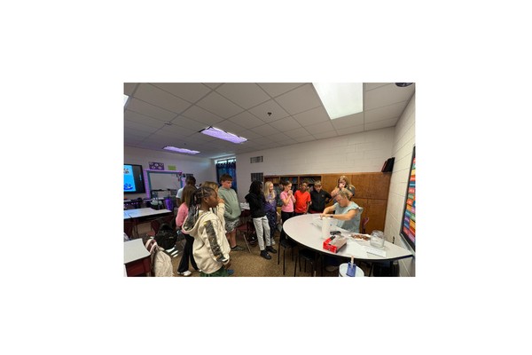 7th graders learning buoyancy with 4-H Program Assistant Rena Potter