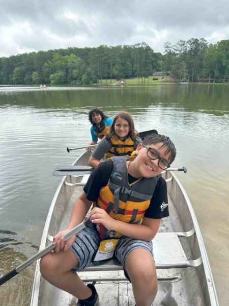 ACC 4-H'ers canoeing at cloverleaf camp