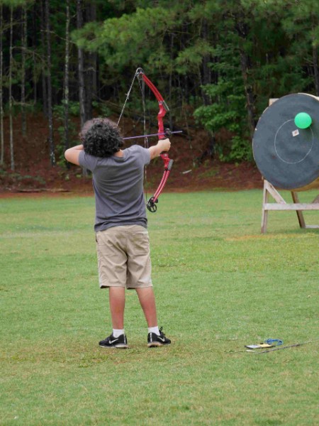 ACC 4-H'er taking am Archery class at Cloverleaf Camp
