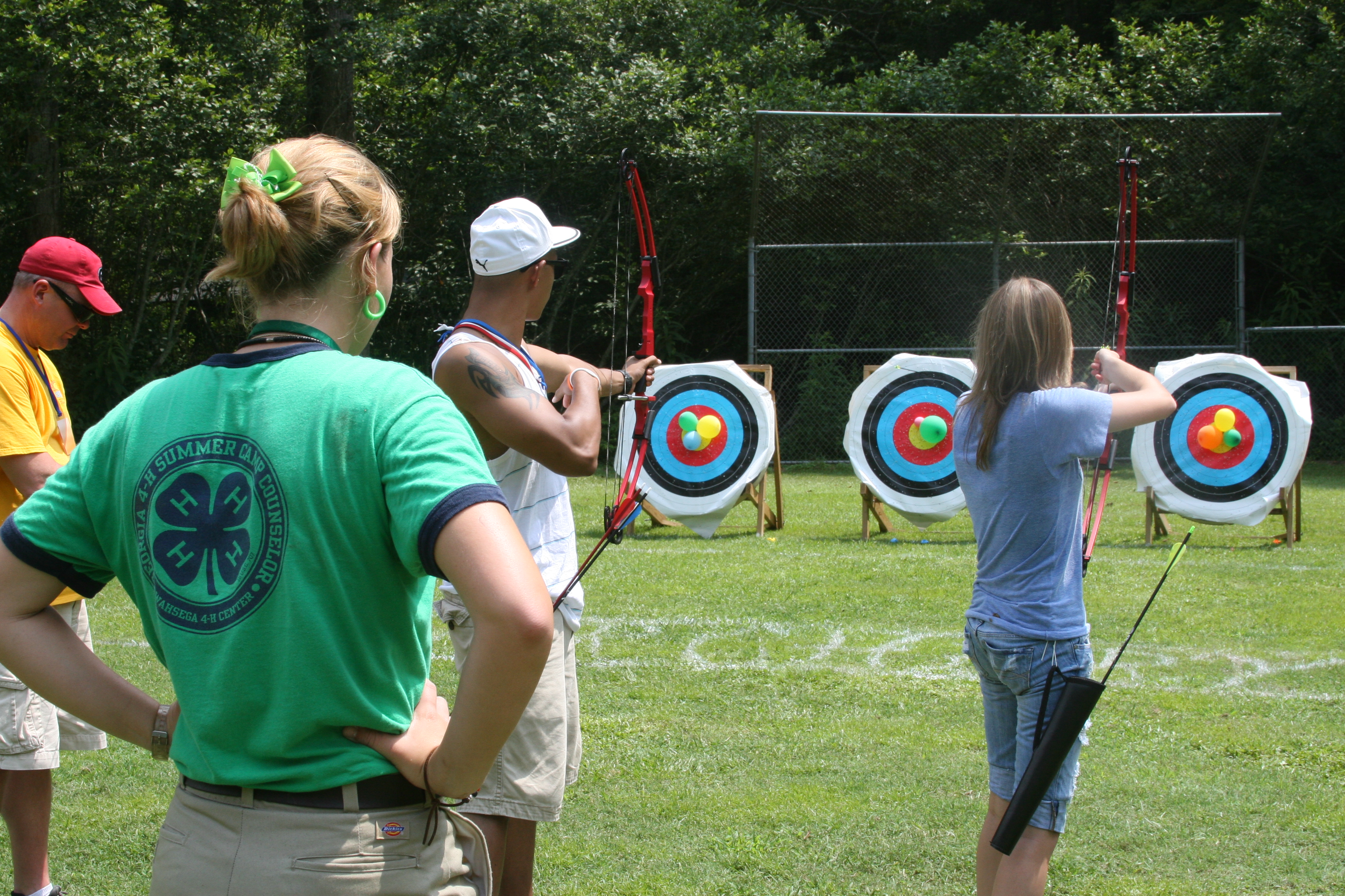 4-H'ers at an archery range